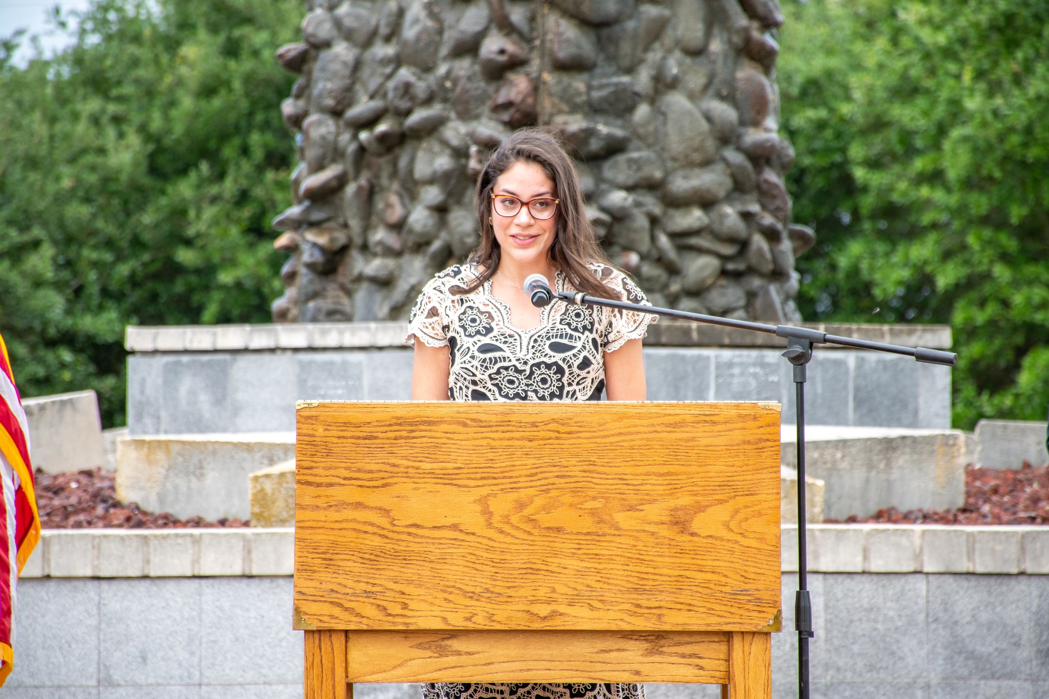 Sydney speaking at a public event